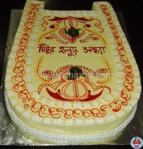Surprise- its a KULA shape cake for Gaye Holud