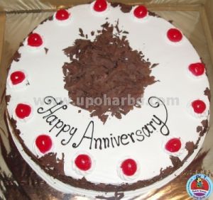 cake with blackforest and lots of cherry