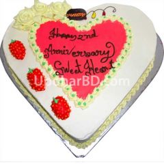 Heart shape cake with strawberry design