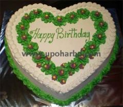 heart shape cake with green design