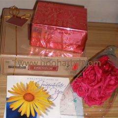 Congratulate her with sweets & CK perfume