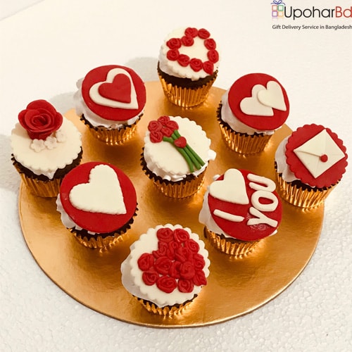 9 cupcakes with red and white hearts