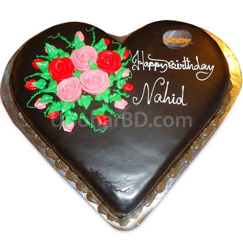 Heart shape rich chocolate cake with roses