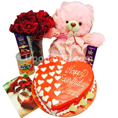Red roses, love cake, chocolate and teddy