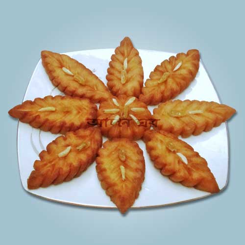 Chanar pakon pitha