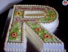 Single letter shape cake with Garden design