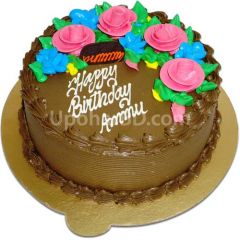 Cake with rich chocolate and pink roses