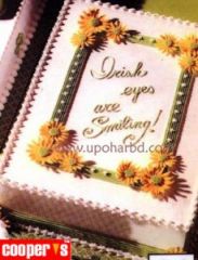 Cake with green frame and yellow flower