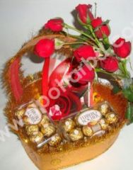 Gift package with chocolates and rose