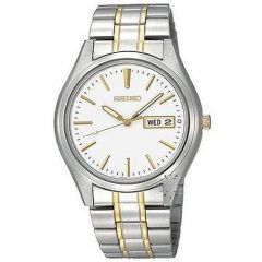 Silver colour Seiko wrist watch with round dial